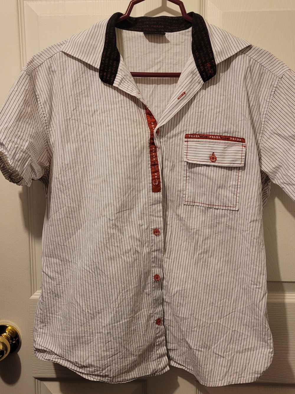 Prada Mens Short Sleeve Button-Up Shirt in White with Black Collar and Red Trim